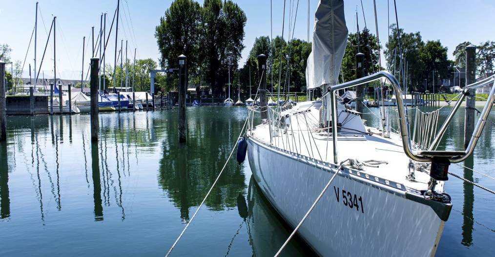 Photo of a yacht moored on the water.